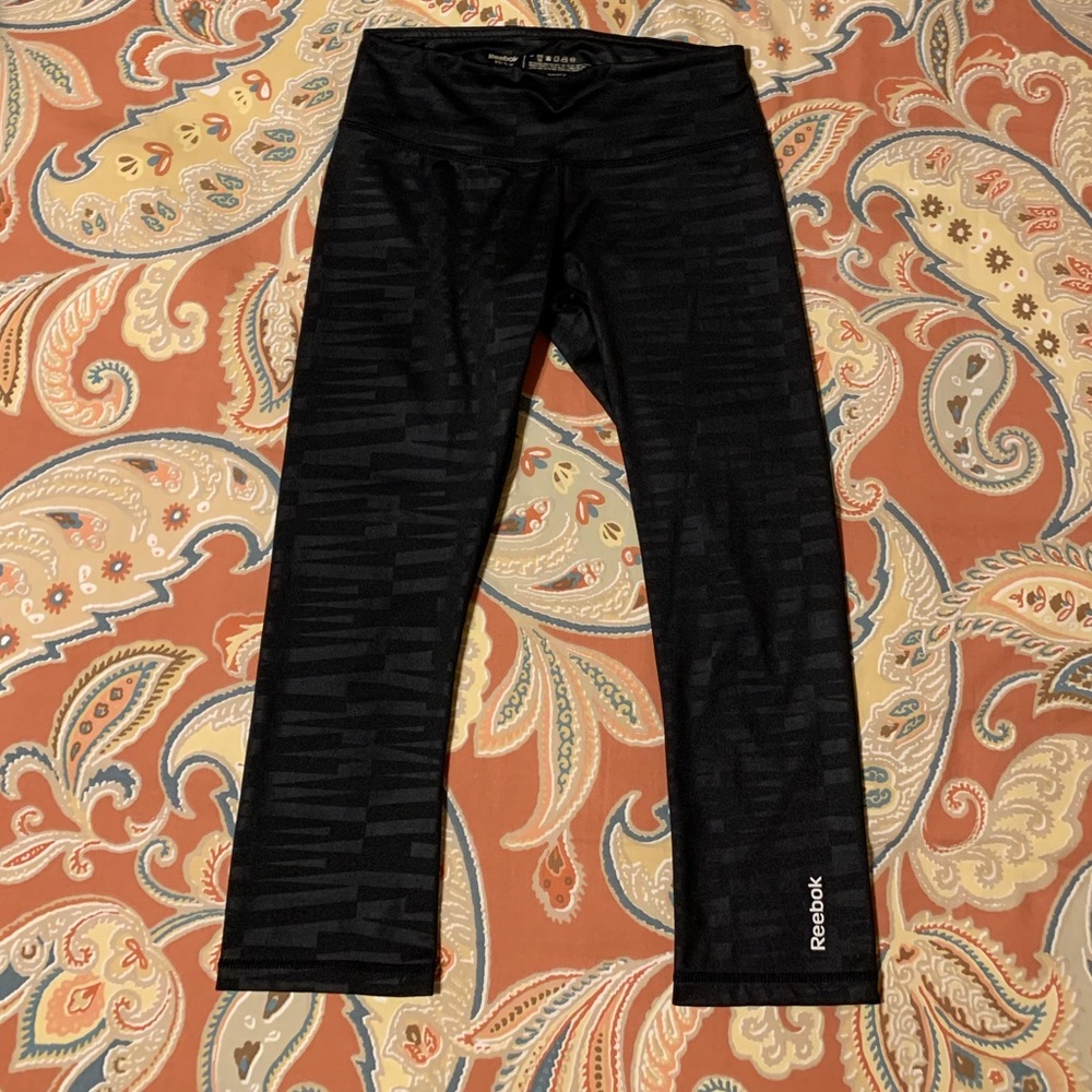 Black mid-rise Reebok Capri leggings